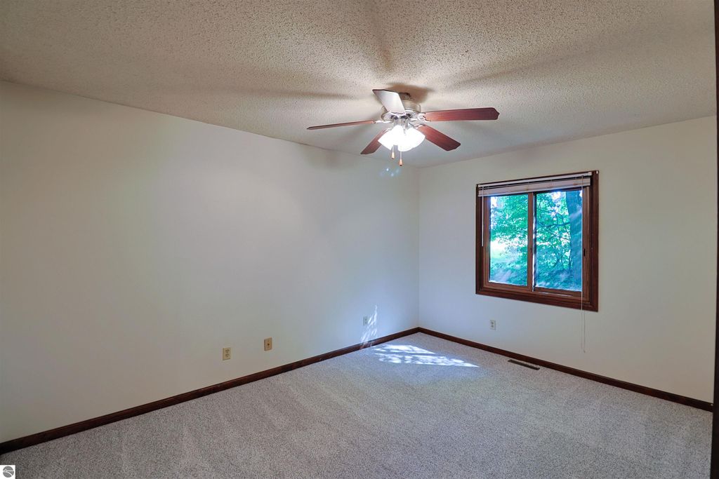 Image 14 of property listing at 8800 Golfside Court, Shepherd, MI 48883