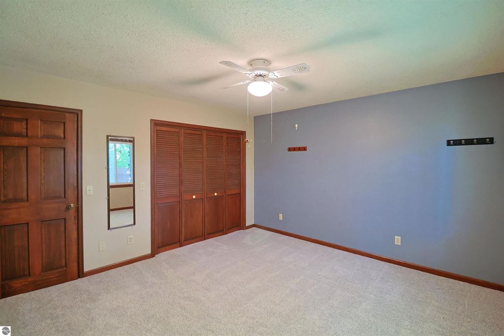 Image 15 of property listing at 8800 Golfside Court, Shepherd, MI 48883