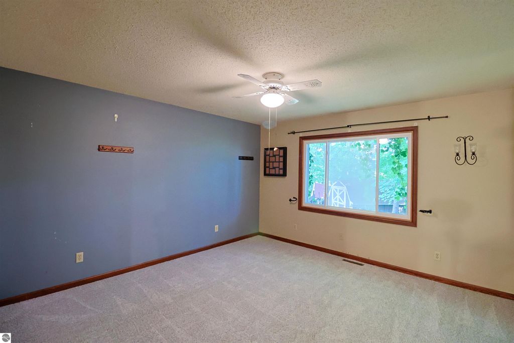 Image 16 of property listing at 8800 Golfside Court, Shepherd, MI 48883