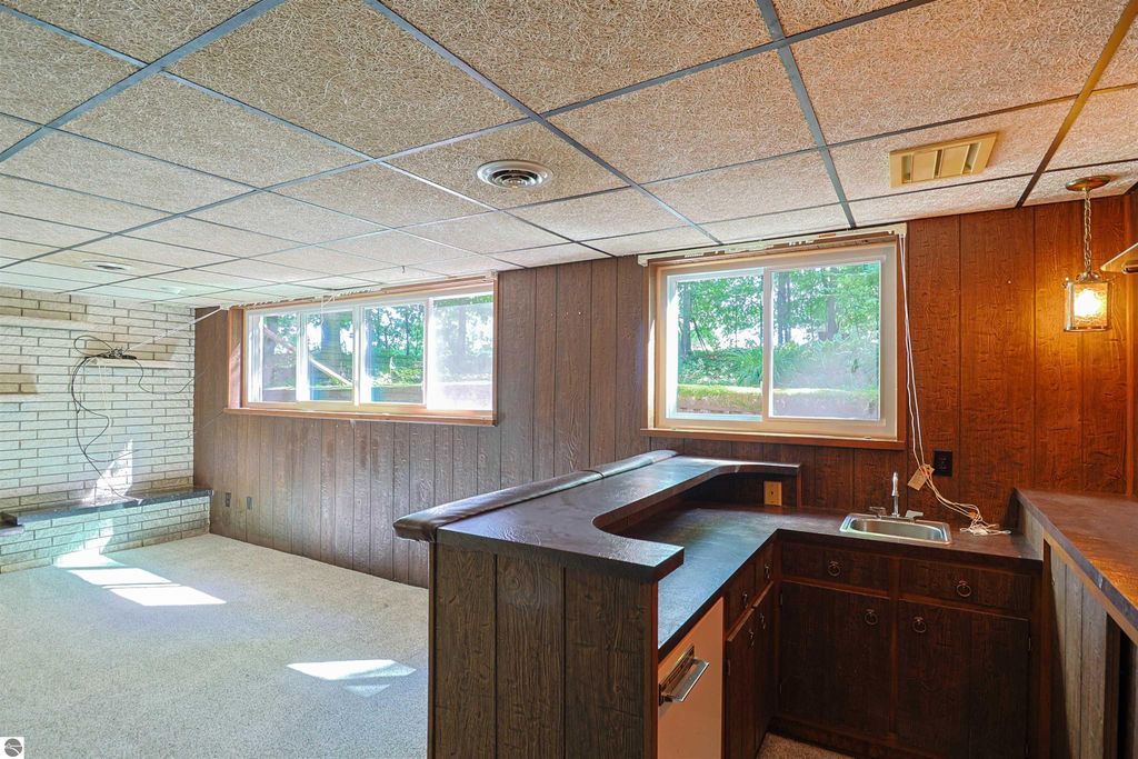 Image 25 of property listing at 8800 Golfside Court, Shepherd, MI 48883