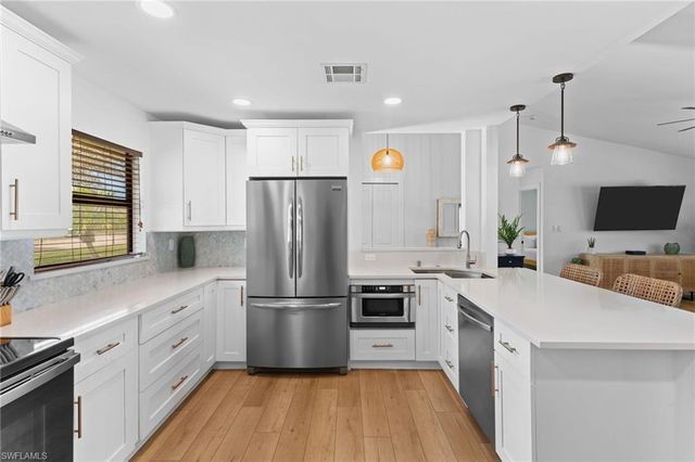 2451 River Reach DR, Naples, FL 34104