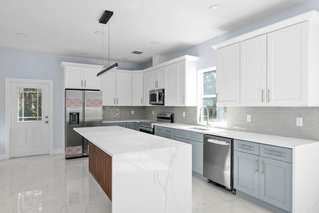 8119 N DAKOTA AVENUE, Tampa, FL 33604