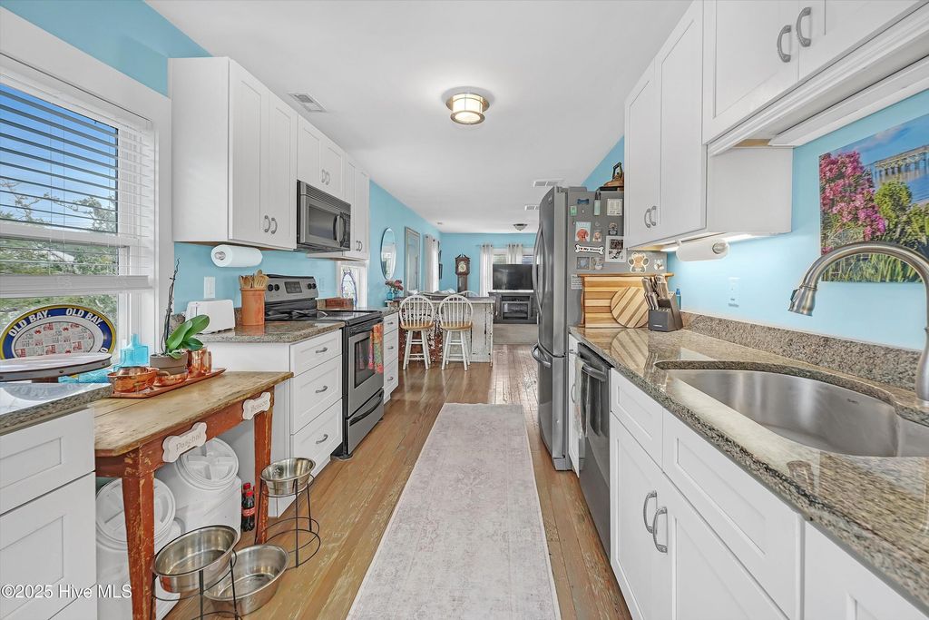 Image 31 of property listing at 211 N Howe Street, Saint James, NC 28461