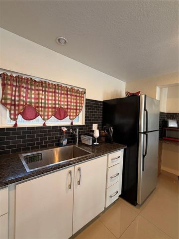 1212 E COLUMBUS DRIVE Down, Tampa, FL 33605