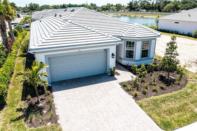 6957 HONEYBELL DRIVE, Nokomis, FL 34275