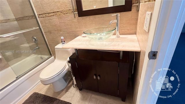 401 Golden Isles Dr 101, Hallandale Beach, FL 33009