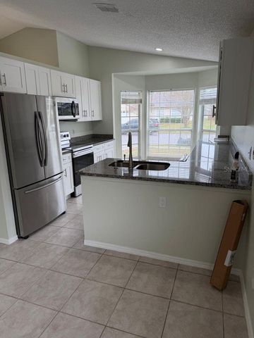 13875 GLASSER AVENUE, Orlando, FL 32826