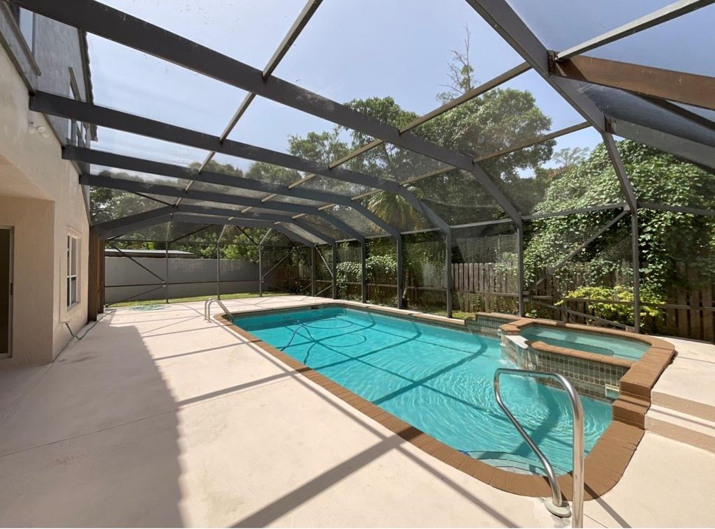 Image 2 of property listing at 6805 NW 75th Pl, Parkland, FL 33067