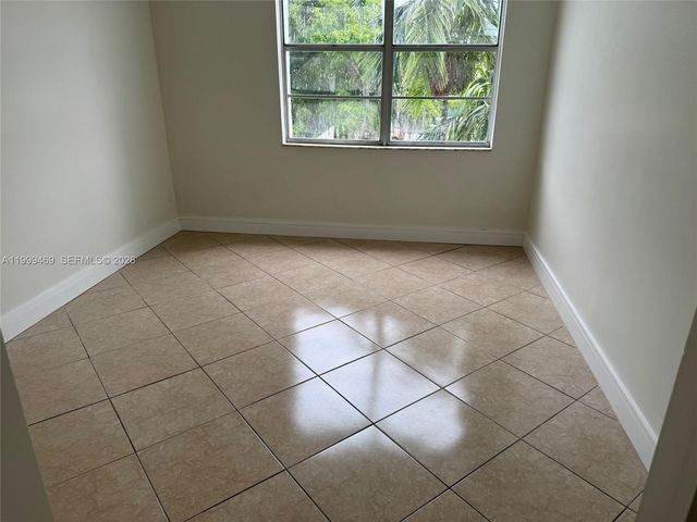 492 NW 165th St Rd C-309, Miami, FL 33169