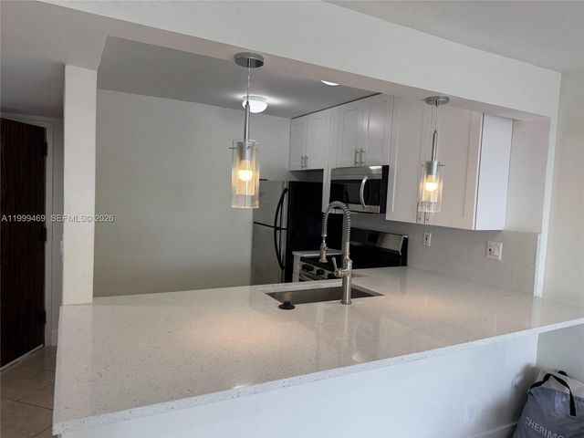 492 NW 165th St Rd C-309, Miami, FL 33169