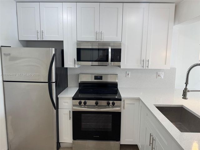 492 NW 165th St Rd C-309, Miami, FL 33169