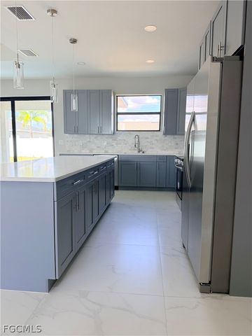 703 NW 1st TER, Cape Coral, FL 33993