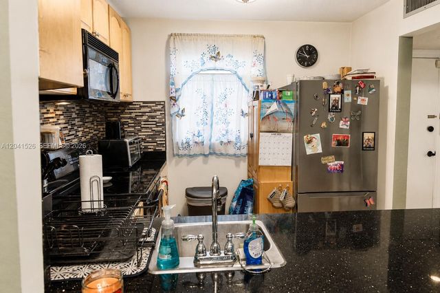 12014 S Greenway Cir S 105, Royal Palm Beach, FL 33411