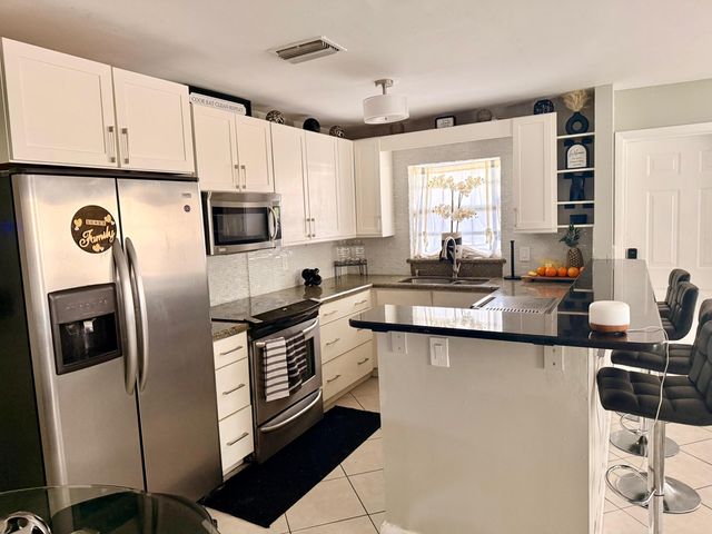 10088 Boynton Place Circle, Boynton Beach, FL 33437