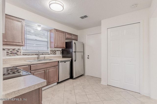 8209 WORM WOOD Road, Jacksonville, FL 32210