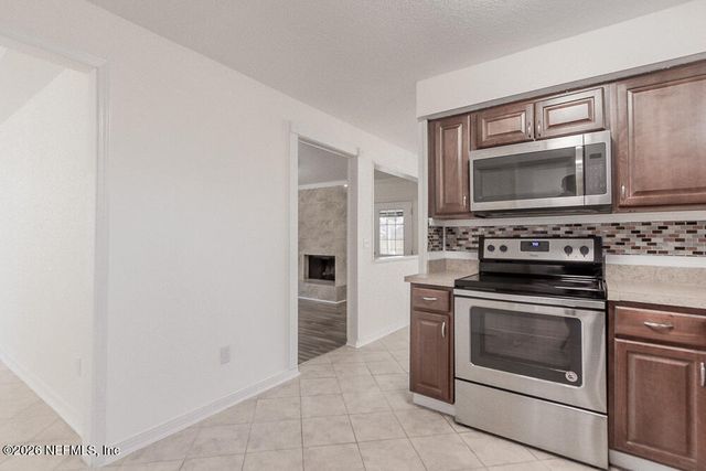 8209 WORM WOOD Road, Jacksonville, FL 32210