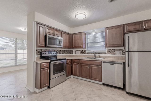 8209 WORM WOOD Road, Jacksonville, FL 32210