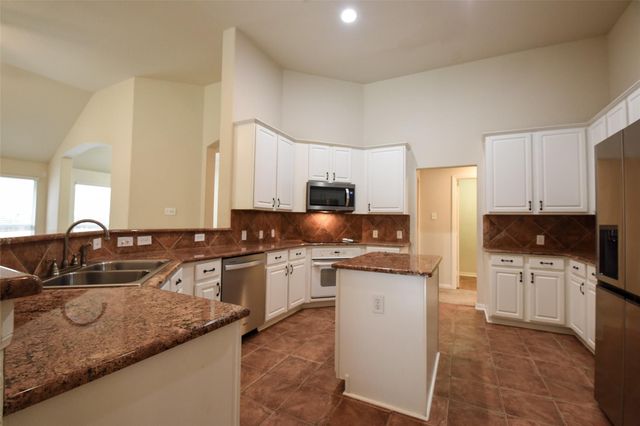 22 Hobbit Glen Drive, Conroe, TX 77384