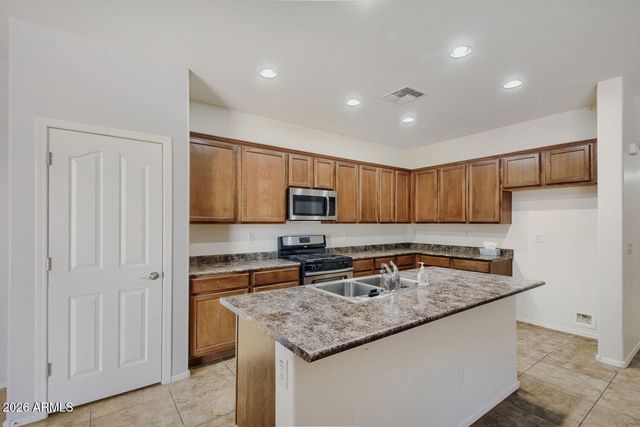 18140 W PURDUE Avenue, Waddell, AZ 85355