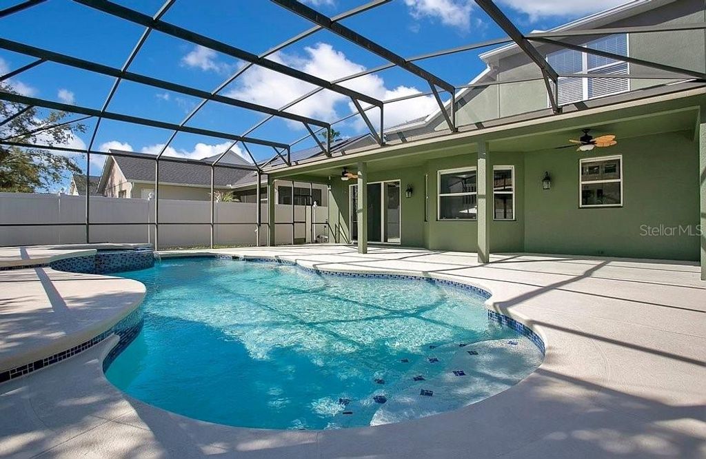 Image 2 of property listing at 14149 LAKE LIVE OAK DRIVE, Orlando, FL 32828
