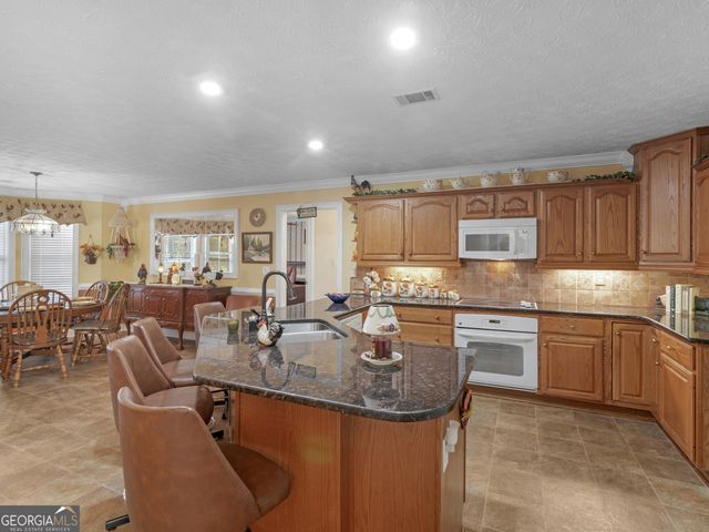 1220 Lake Stone Lea Drive, Oxford, GA 30054