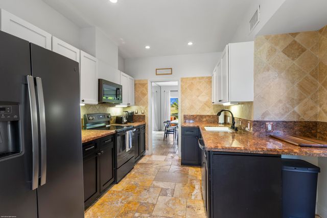 2624 Muirfield Court, Wellington, FL 33414