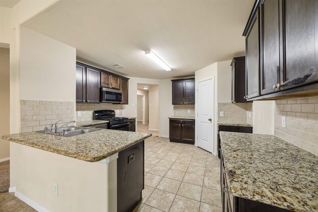 9307 Rustling Manor Lane, Richmond, TX 77407