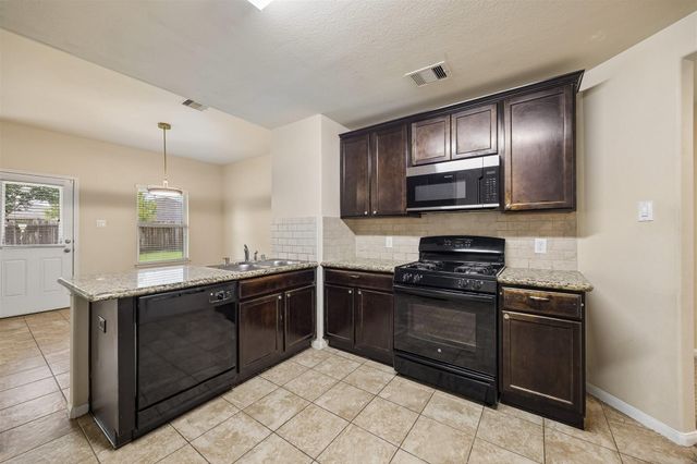 9307 Rustling Manor Lane, Richmond, TX 77407