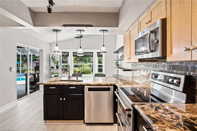2667 River Reach DR, Naples, FL 34104