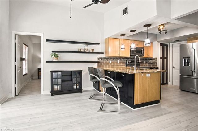 2667 River Reach DR, Naples, FL 34104