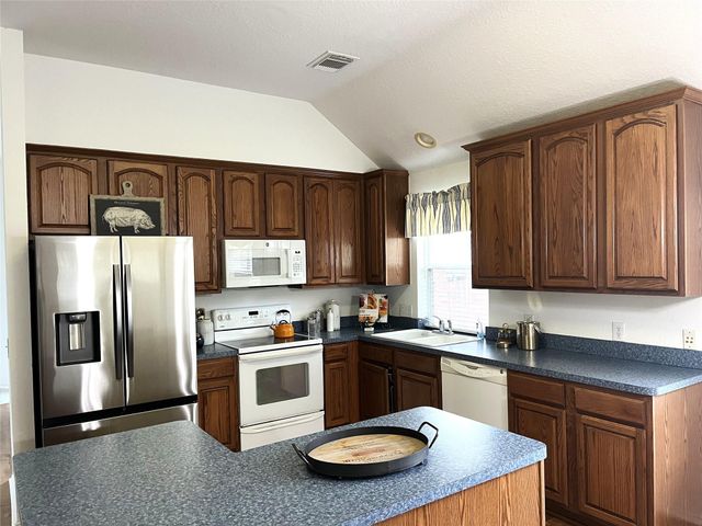 1210 Oak Canyon Lane, Richmond, TX 77469