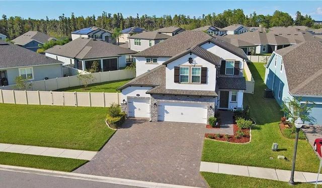 1049 MULTIFLORA LOOP, Lutz, FL 33558