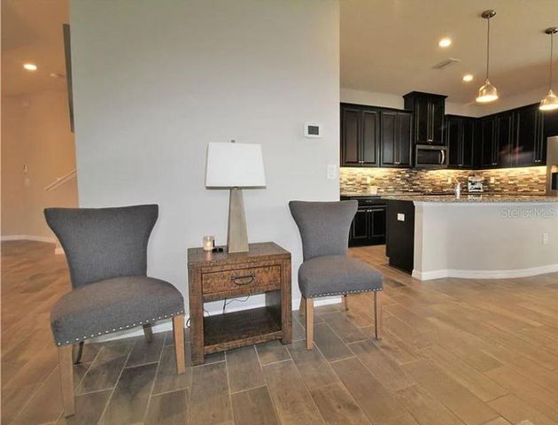 1049 MULTIFLORA LOOP, Lutz, FL 33558