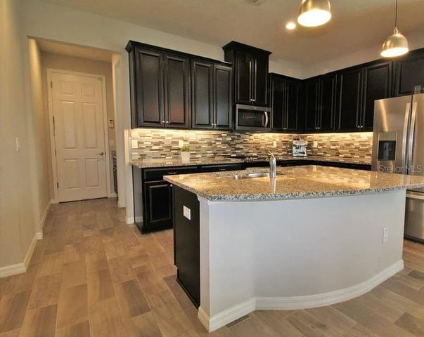 1049 MULTIFLORA LOOP, Lutz, FL 33558