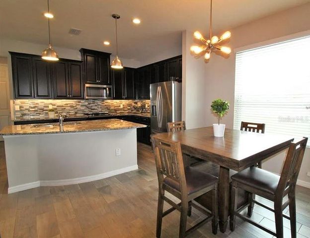 1049 MULTIFLORA LOOP, Lutz, FL 33558