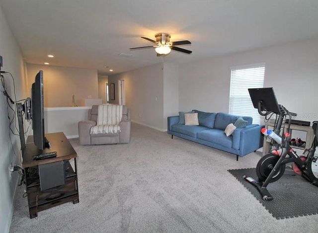 1049 MULTIFLORA LOOP, Lutz, FL 33558