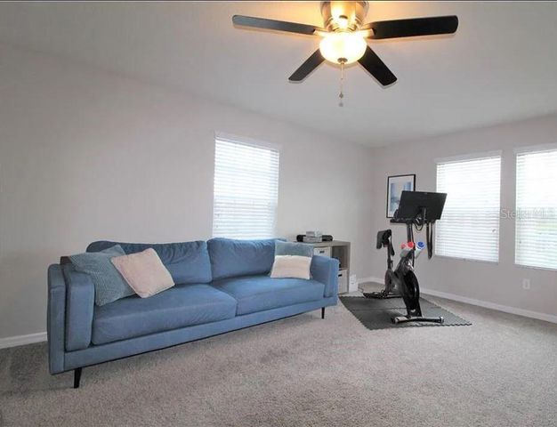 1049 MULTIFLORA LOOP, Lutz, FL 33558