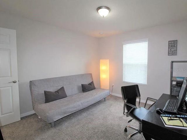 1049 MULTIFLORA LOOP, Lutz, FL 33558