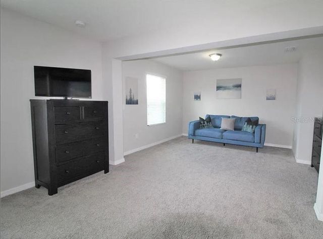 1049 MULTIFLORA LOOP, Lutz, FL 33558