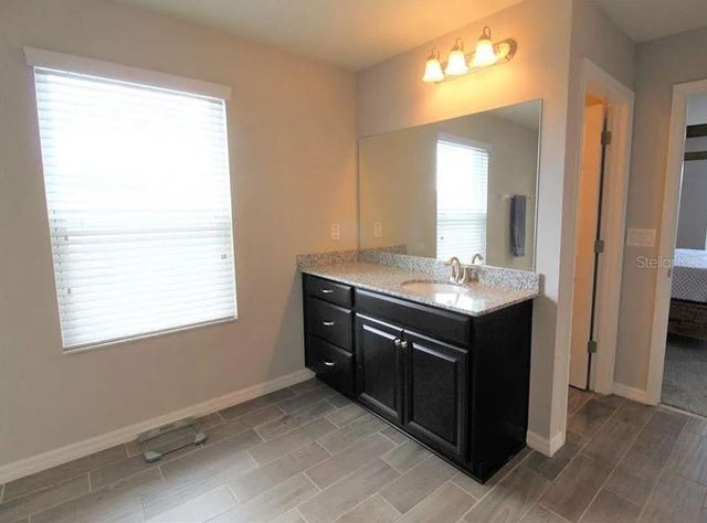 1049 MULTIFLORA LOOP, Lutz, FL 33558