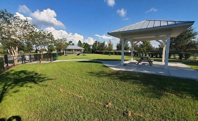 1049 MULTIFLORA LOOP, Lutz, FL 33558