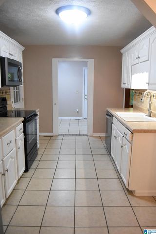 1564 PEACEBURG LANE, Weaver, AL 36277