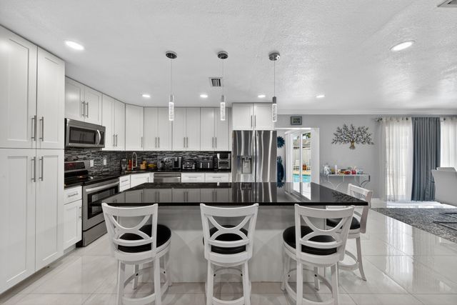 650 NW 38th Place, Deerfield Beach, FL 33064