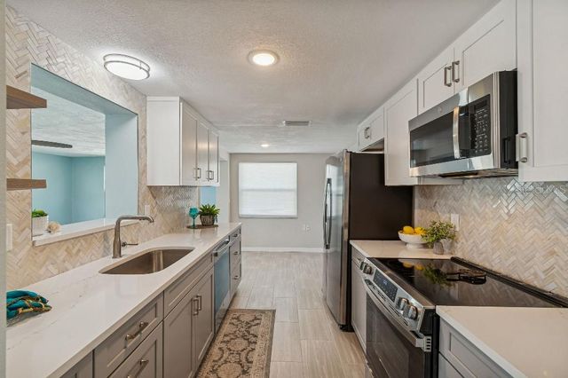 1147 RUSHMORE DRIVE, Holiday, FL 34690