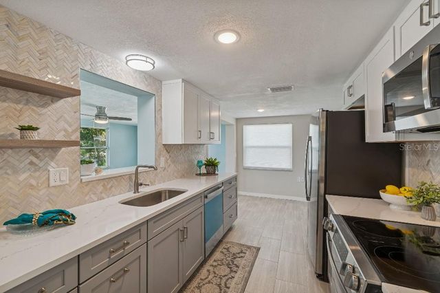 1147 RUSHMORE DRIVE, Holiday, FL 34690