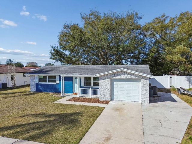 1147 RUSHMORE DRIVE, Holiday, FL 34690