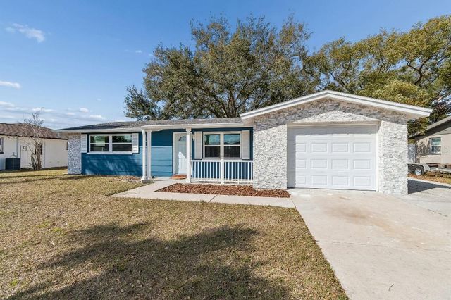 1147 RUSHMORE DRIVE, Holiday, FL 34690