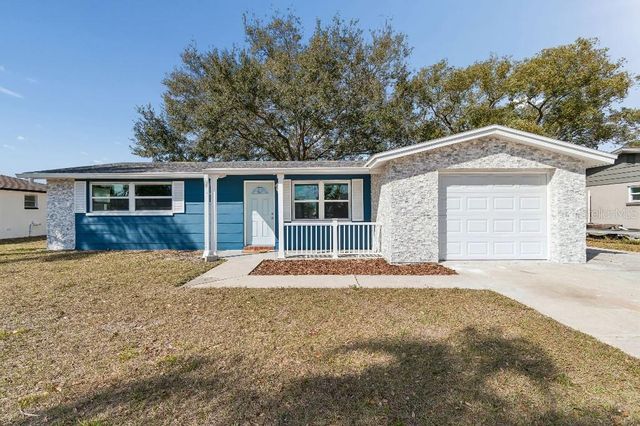 1147 RUSHMORE DRIVE, Holiday, FL 34690