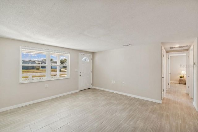 1147 RUSHMORE DRIVE, Holiday, FL 34690