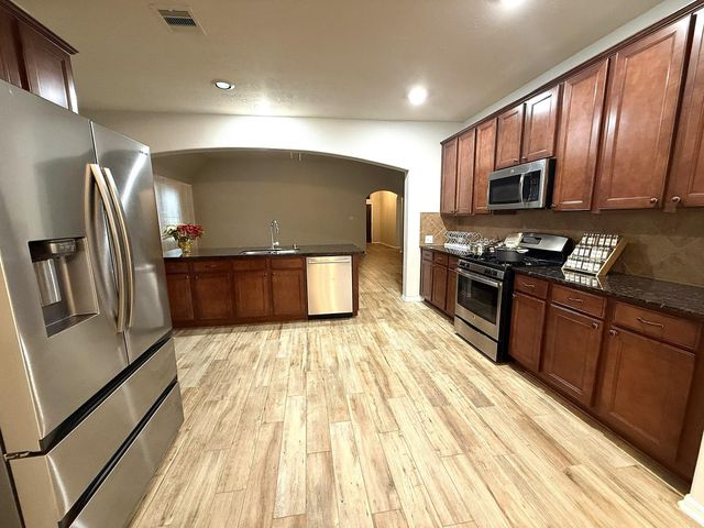 14322 Heath Falls Lane, Cypress, TX 77429